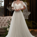 ROBE EN TULLE AVEC DOS EN V ET NOEUD