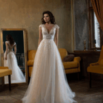 ROBE AVEC MANCHES FLUIDES ET BAS FLUIDE AVEC FENTE