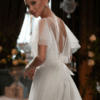 ROBE EN TULLE AVEC DOS EN V ET NOEUD
