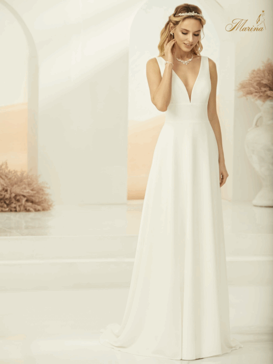 Robe fluide prestige et dos en V.