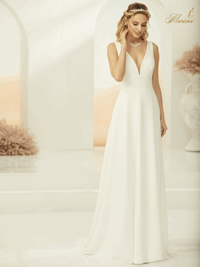 Robe fluide prestige et dos en V.