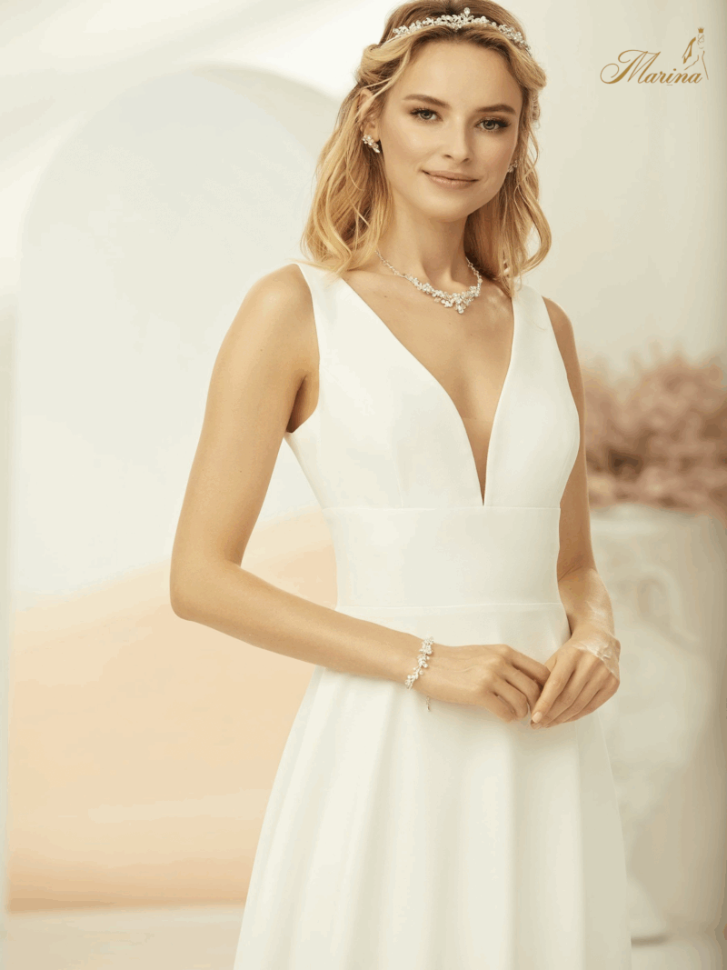 Robe fluide prestige et dos en V.