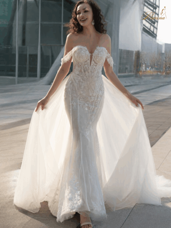 Robe sirène avec tulle et paillettes avec surjupe.
