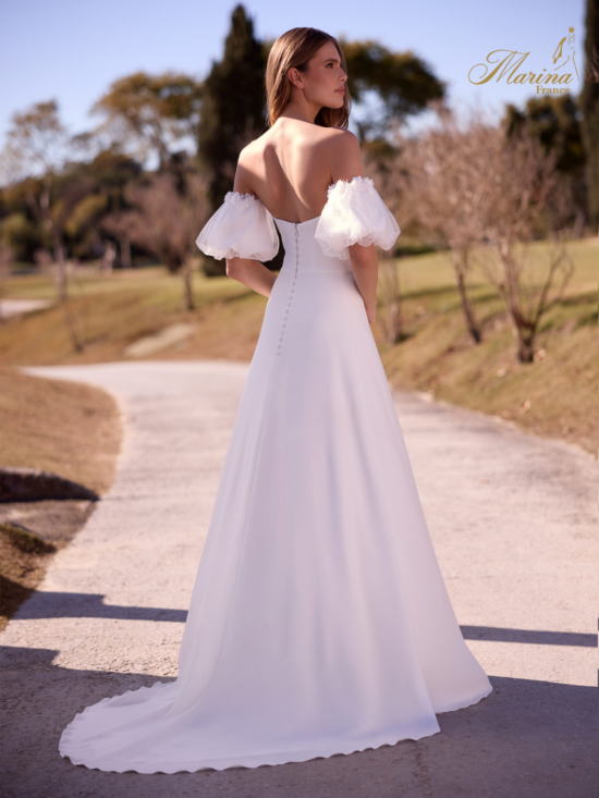 ROBE BUSTIER AVEC MANCHES ET FLUIDE